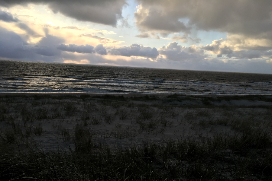 Foto Meer und Wellen im Sonnenuntergang